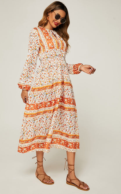 Midi-jurk met bloemenprint in oranje